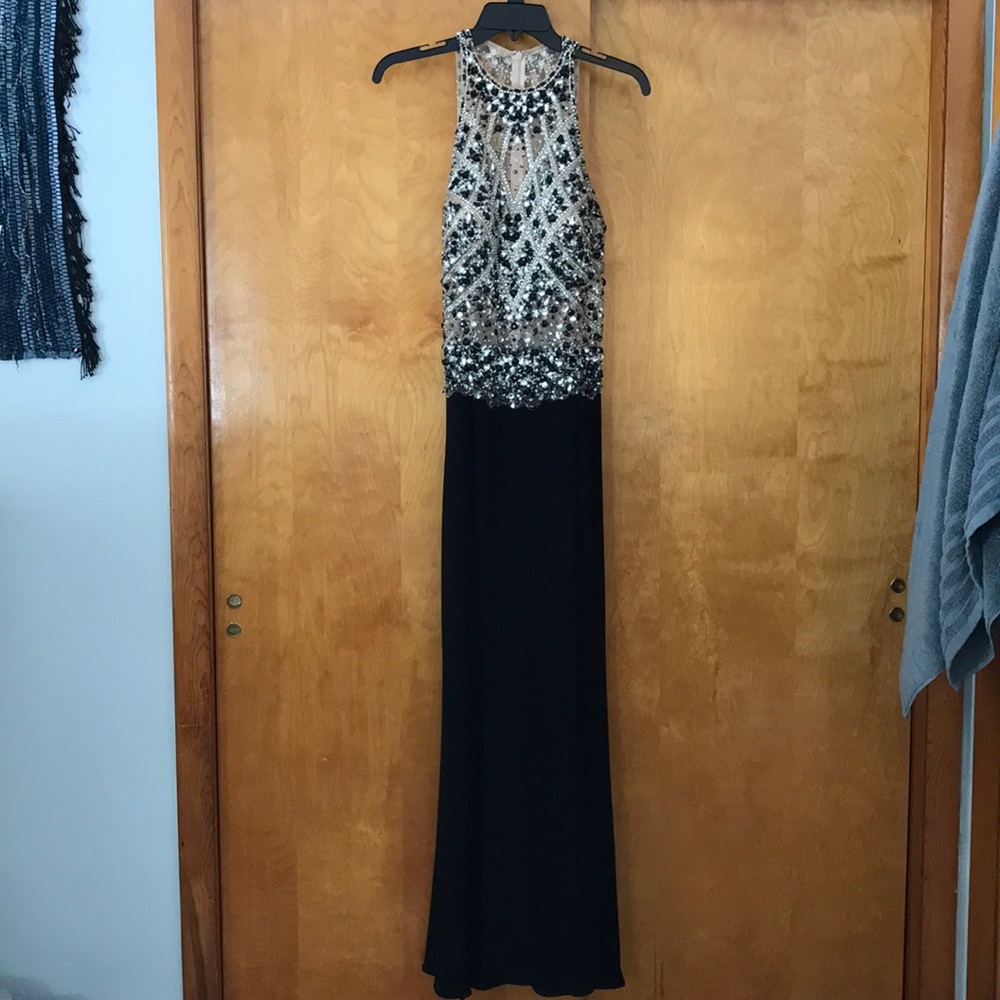 Black jeweled nude prom dress